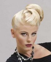 2015 prom hairdo with side knot with pulled bang