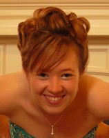 Curved prom hairdo with long side bang