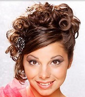 Fancy prom hairstyle with curls and and long straight swept side bang