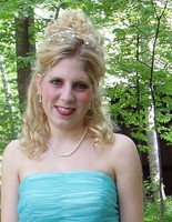 Half prom hairstyles picture with side bangs and pearl hairclips