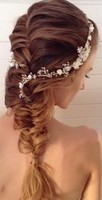 Prom hair with unique braids with little flowers