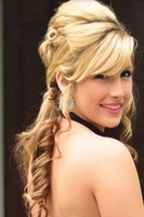 Prom half updo hairstyle with long hair and curls
